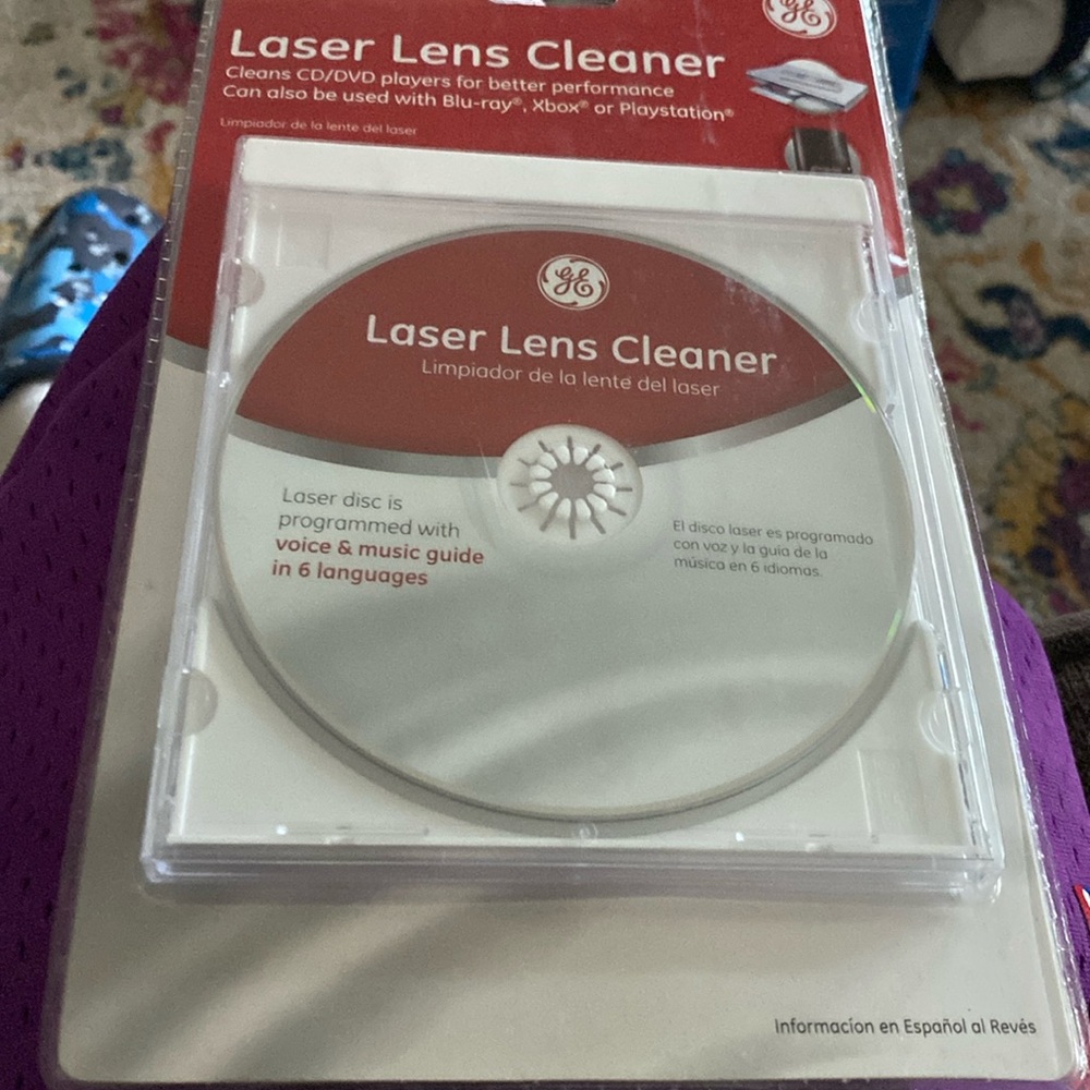 Laser lens cleaner